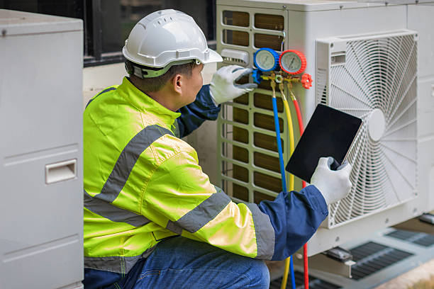 Professional Heat Pump Repair technician working in Eureka, IL